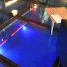 Hôtel de Bourgtheroulde - vue plongeante dans la piscine au travers des dalles de verre du bar.