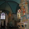 Eglise Saint Miliau. A droite du chœur, le retable de Saint Miliau attribué à Guillaume Lerrel.