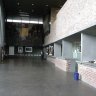 Le musée de La Piscine. Dans le hall qui donne accès à la Boutique, au Restaurant Meert et aux différentes salles d'exposition : une toile de Marcel Gromaire (1892-1972), L'Abolition de l'Esclavage (1950).
